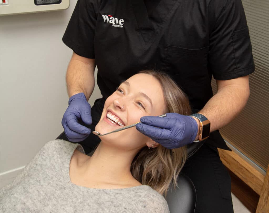 smiling in the dentist chair in white rock