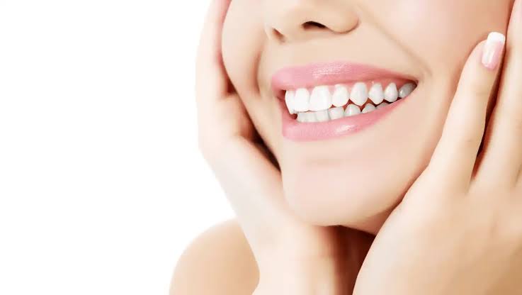 Close-up of a smiling patient with bright, healthy teeth, representing the confidence and predictability offered by 3D smile design.